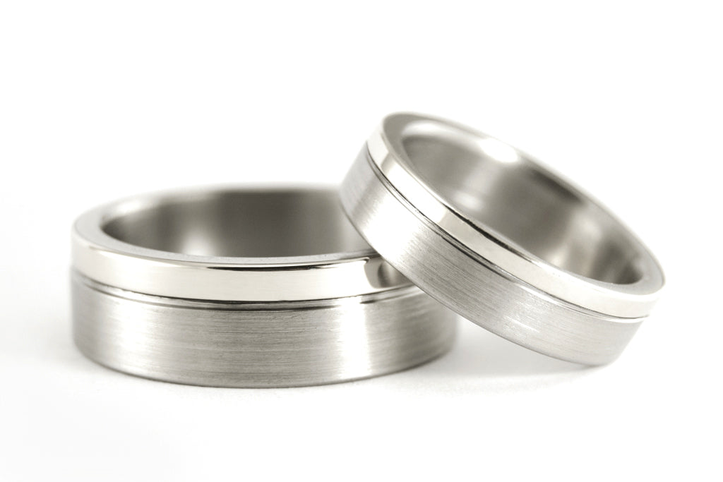 18ct white gold and titanium wedding bands (00557_4N7N)